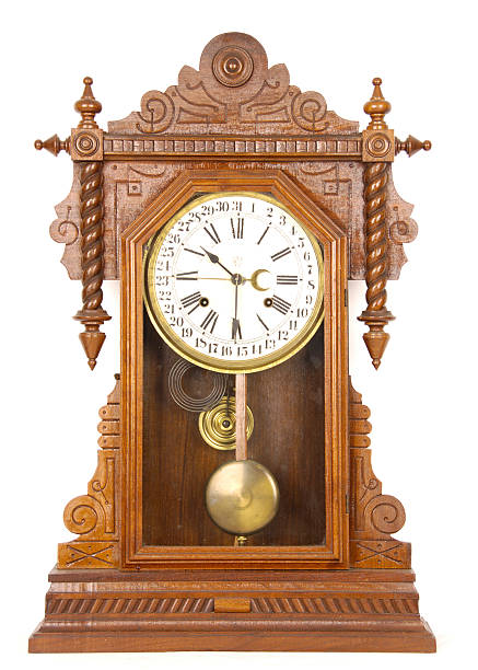 istock Antique wooden pendulum clock with Roman numerals 172765988