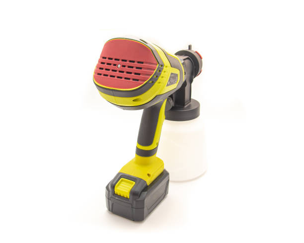 istock Rear view cordless paint sprayer gun with battery isolated on white background, adjustable nozzle, flow adjustment, quick release knob, switch trigger, spray bottle 1727662434