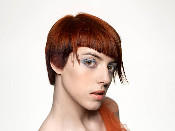 beautiful model with short red hairstyle stock photo