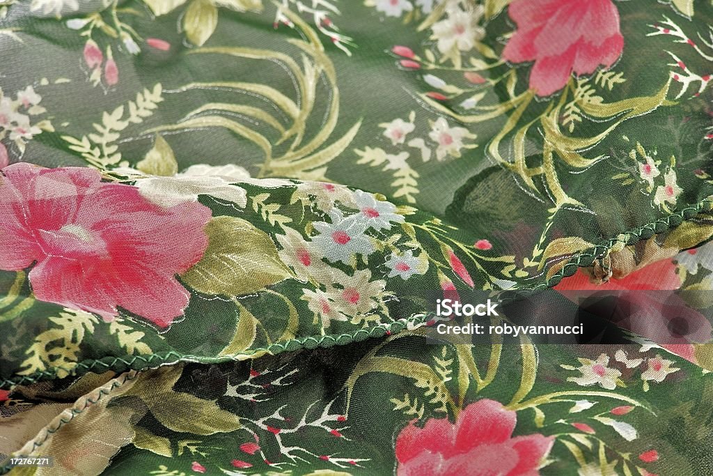Floral motif on a silky scarf; background Floral motif on a silky scarf; backgroundCloth: Art Stock Photo