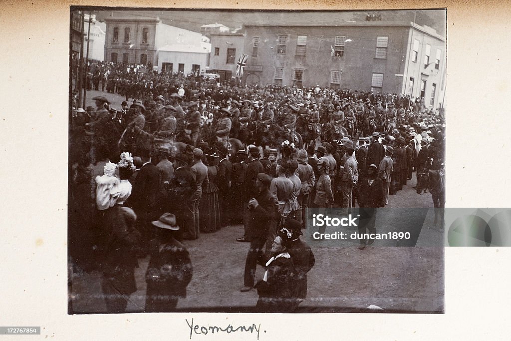 Yeomanry Vintage photograph of British Yeomanry cavalry riding down a street, South Africa  (Cape Town) at the time of the Second Boer War in 1900 Large Group Of People Stock Photo