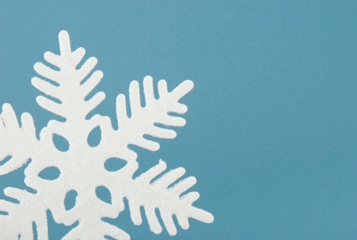 A snowflake ornament with space for text.