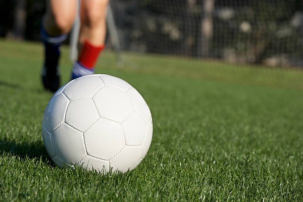 istock Kicking soccer ball 172768260