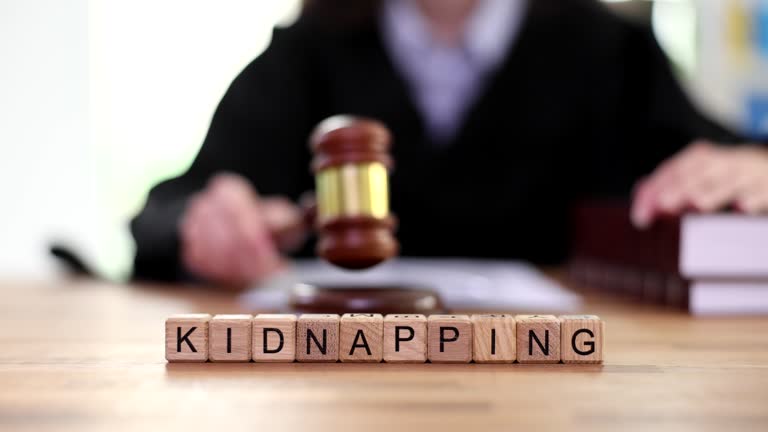 Kidnapping text and judge knocking gavel in court