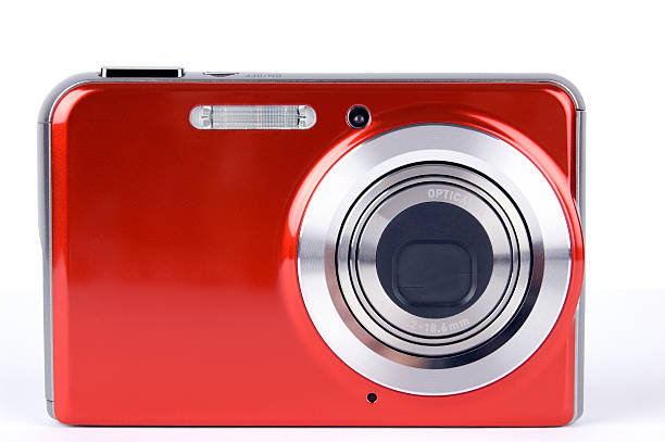 Close-up of a red digital camera on a white background