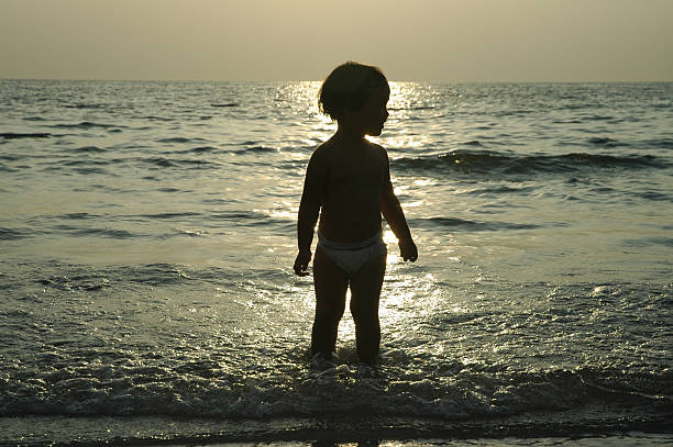 istock Toddler at the beach 172769375