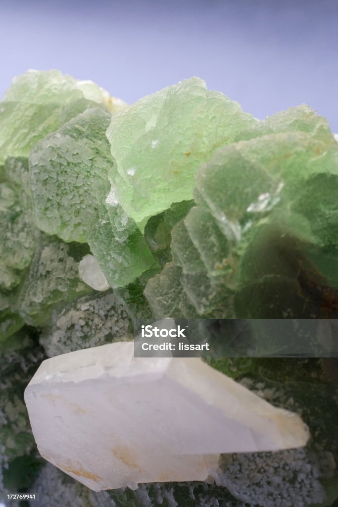 Rocks and Minerals - Fluorite, Calcite Green fluorite and platey calcite. Focus on translucent area of green mineral.A whole view: Calcite Stock Photo