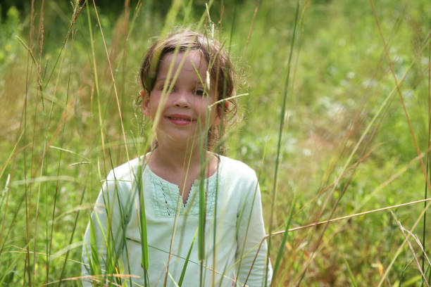 istock Happy girl on the green field 172770043