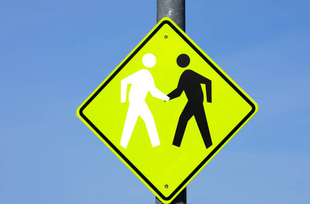 istock Sign of black & white stick figures shaking hands 172770125