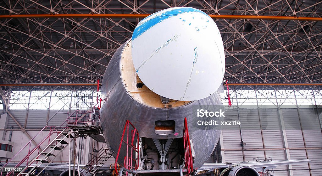 Flight under Maintenance Airplane Hangar Stock Photo