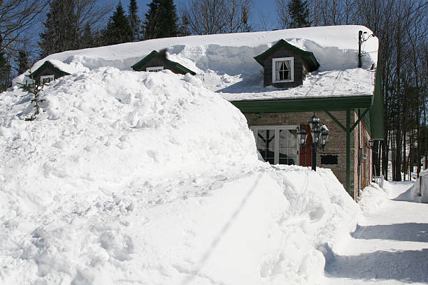 House behind snow mountain, Quebec, winter 2008