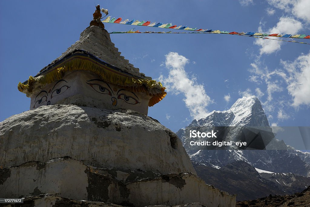 small stupa near Dingboche Small stupa in the Everest area. In the background mount Cholatse (6440 metres). Tibetan prayer flags.See also my lightbox Himalaya Nepal Tibet Asia Stock Photo