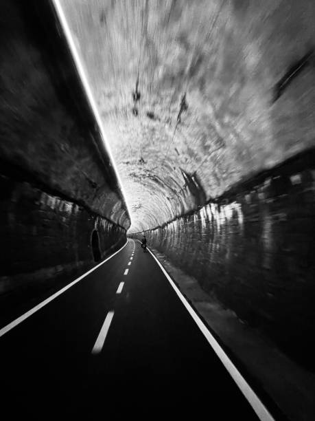 istock Biking through abandoned railway tunnel 1727718478