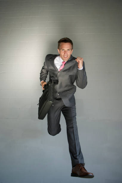 istock Businessman Jumping in the Spotlight 172772074