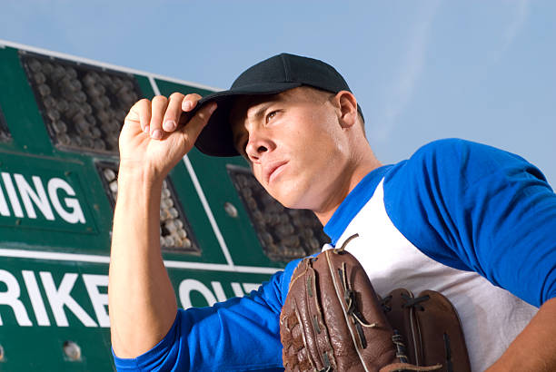 jogador de beisebol - men baseball cap focus determination imagens e fotografias de stock