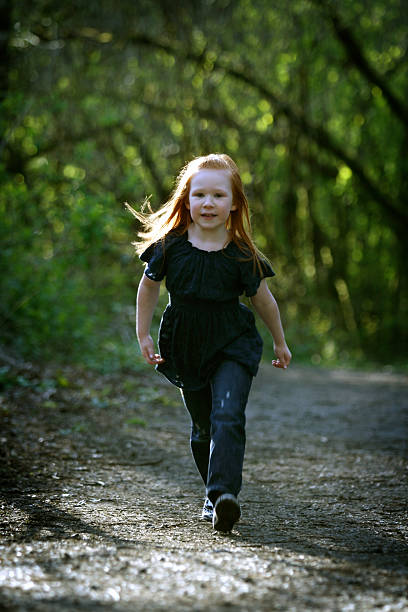 istock Happy Young Girl Playing 172773207