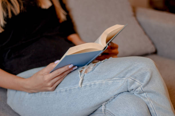 istock Caucasian woman reading book 1727735233