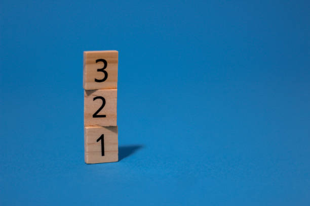 istock Numbers 1, 2 and 3 on wooden tiles 1727737174