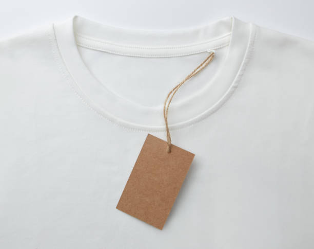 istock Brown price tag on white T-shirt 1727739308