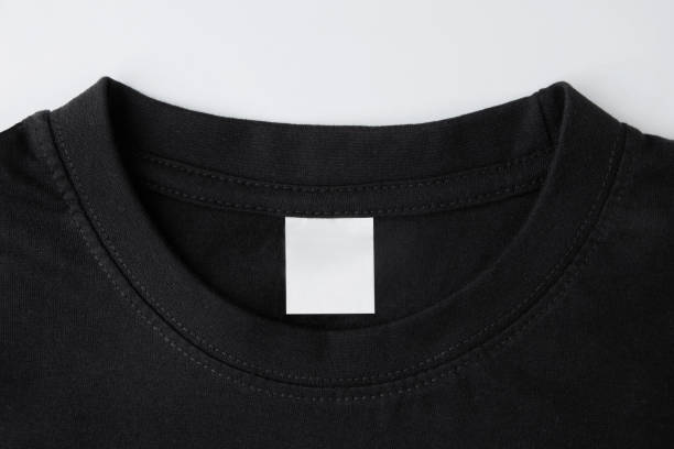 istock blank clothing label on black t shirt 1727740097