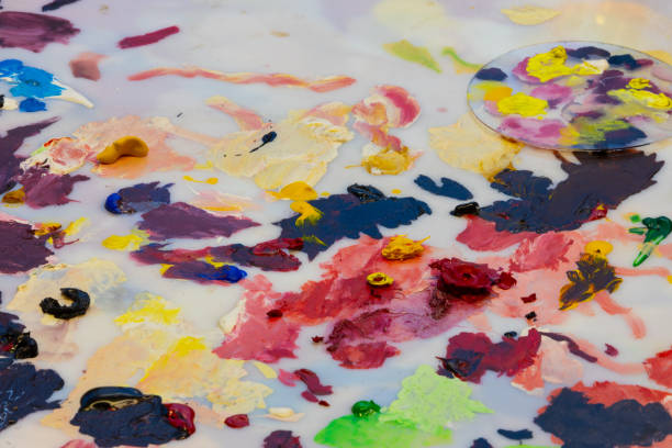 Colorful oil paint stains on the artist palette