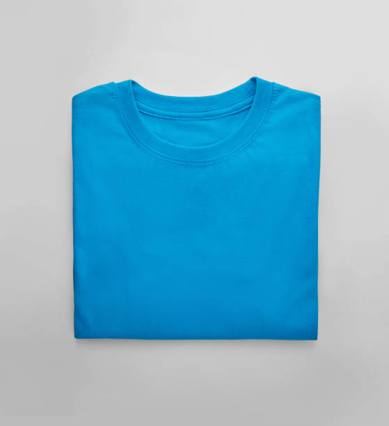 Blue folded t-shirt with on white background