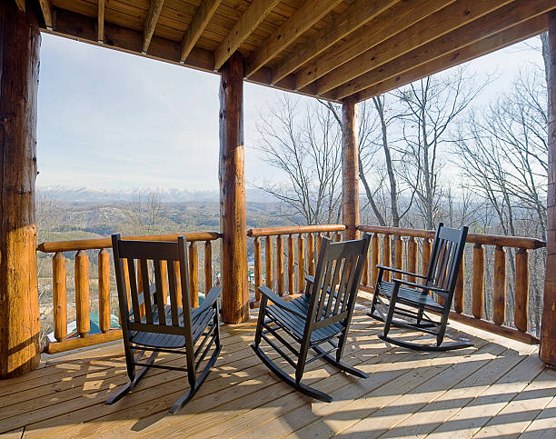 istock Three rocking chairs await the tourist season 172776997
