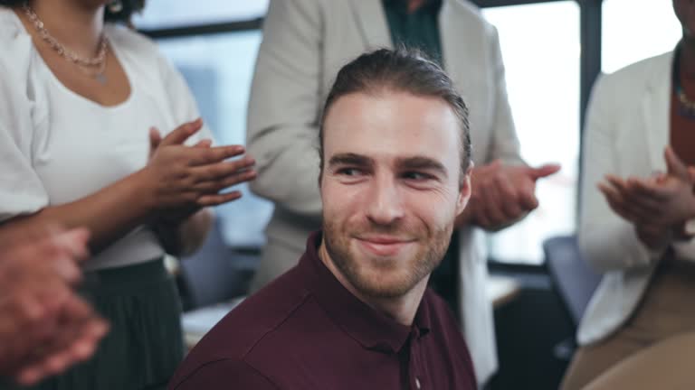 Business people with applause for happy man, promotion and success for office onboarding, congratulations or support. Team, celebration and clapping hands to praise worker for bonus, reward or winner