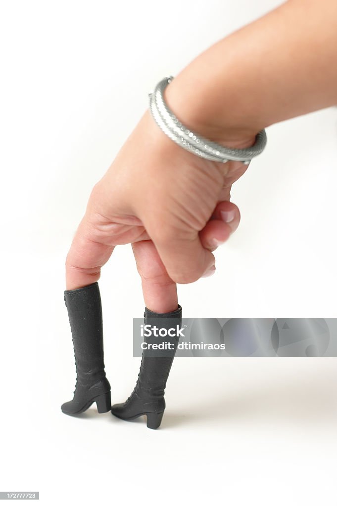 Sexy Extremities! Finger posing in teeny tiny boots. Adult Stock Photo