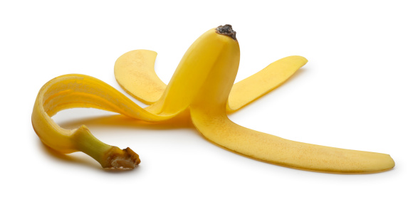 Banana peel on white with soft shadow.