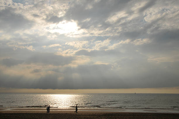 istock Beautiful sky with silhouettes at beach 172778311