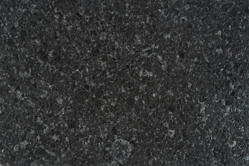 A close-up of a multi-colored granite surfaceClick on the banner below to see more photos like this.