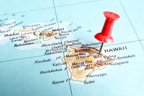 Destination Hawaii Red pin stuck into map of Hawaii big island hawaii islands stock pictures, royalty-free photos & images