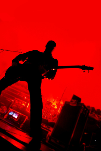 Silhouetted guitar player