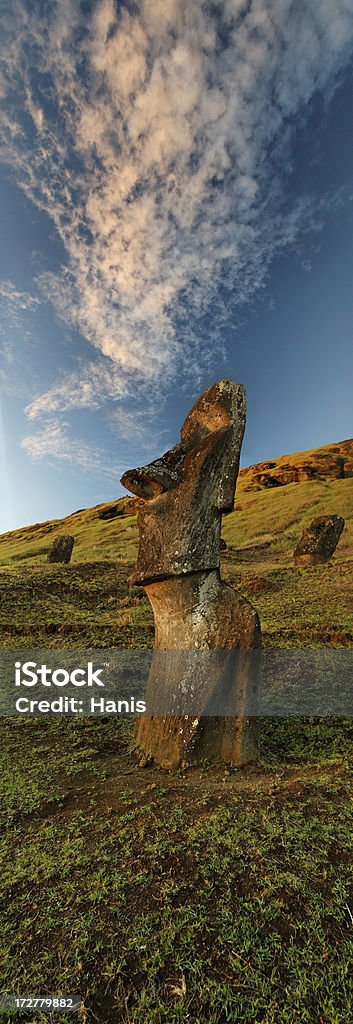 Easter island moai statue Vertical panorama of Rano Raraku moai, evening shot Ancient Stock Photo