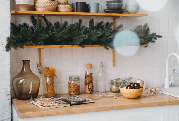 istock Christmas decor on the kitchen with garland in rustic style 1727800725