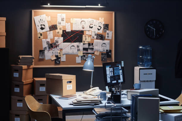 istock Retro detectives office with evidence board lit by ambient lighting 1727804369