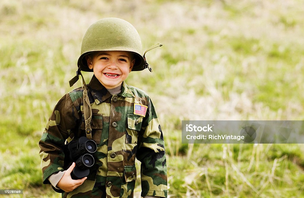 Kid Soldier A young boy dreams of serving his country. American Culture Stock Photo