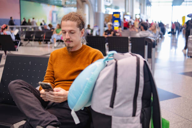 istock Young man staying connected and on time 1727817868