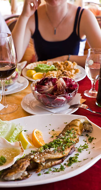 istock Girl, calamari and fish 172782362