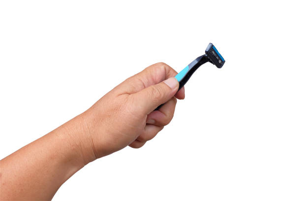 istock Disposable shaving razor in hand.clipping path. 1727824165