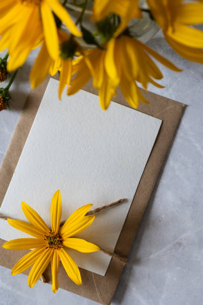 istock A gift card with yellow flowers for Mother's Day. Space for text. 1727832252