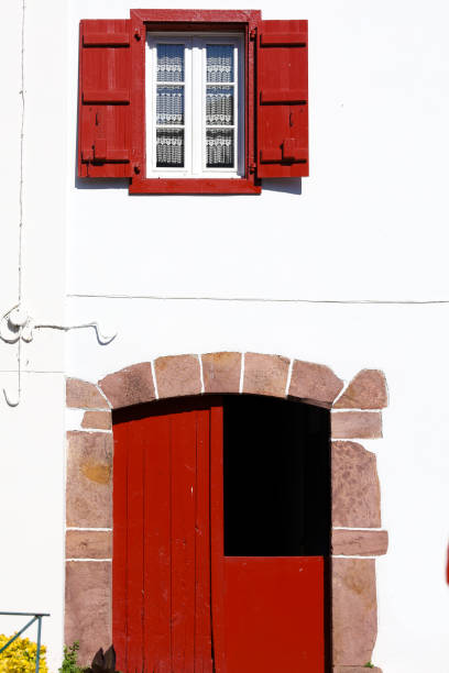 istock Beautiful whitewashed facade in Ainhoa village 1727834590