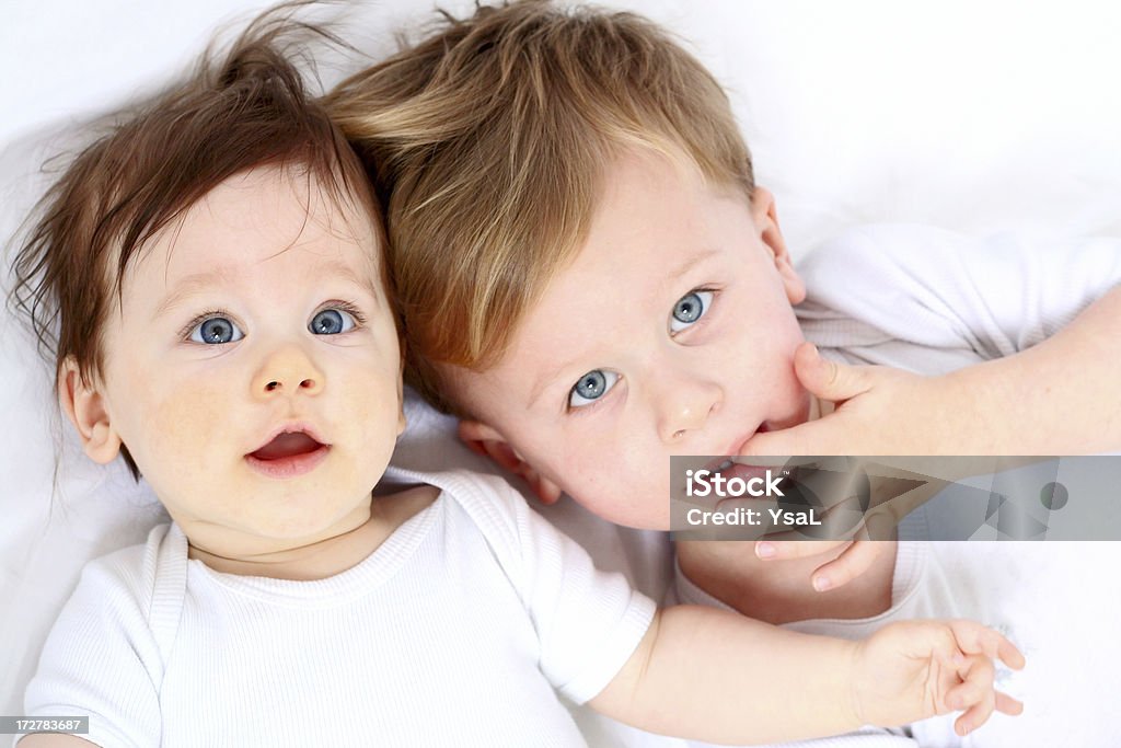 Happy family Brother and sister of 3 years and 10 months. Baby - Human Age Stock Photo