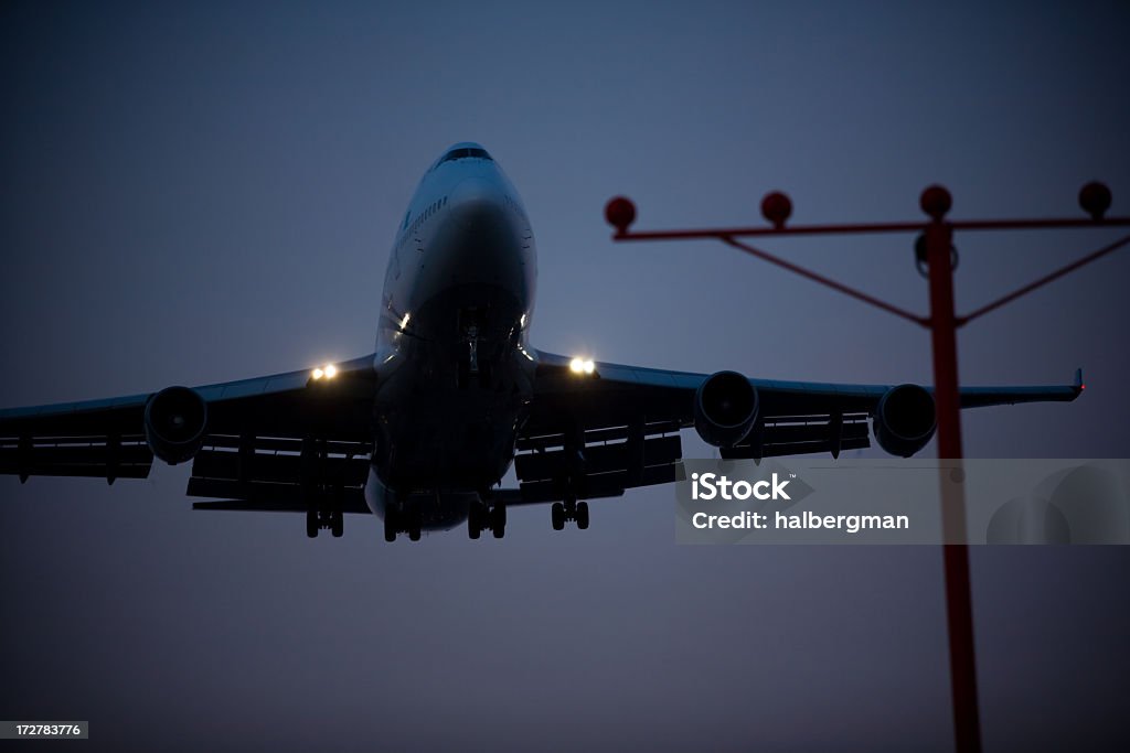 飛行機の離陸する - 夜のロイヤリティフリーストックフォト