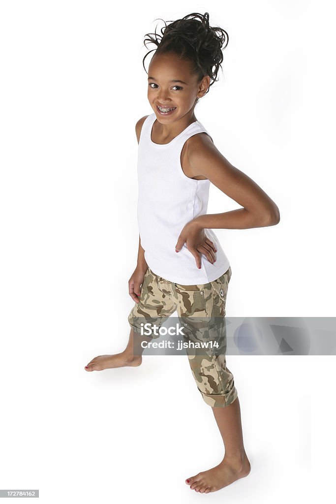 Girl Standing Beautiful young girl standing with confident pose. Girls Stock Photo