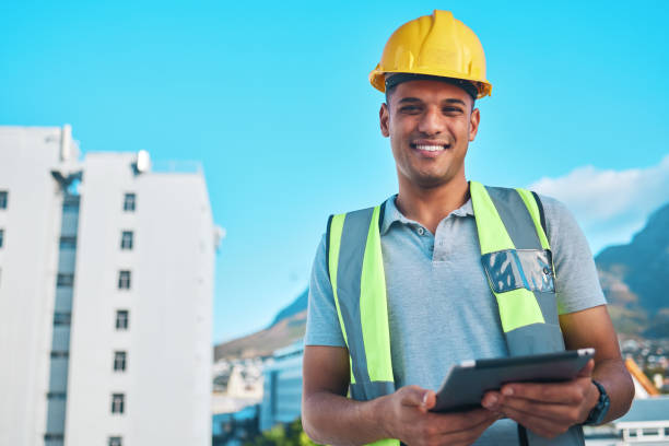 istock Project manager, tablet and portrait of happy man, architect or construction site engineer with digital blueprint design. Civil engineering, city inspector and smile for online infrastructure plan 1727848735
