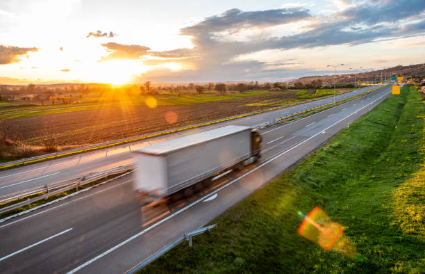 istock Fast blurred highway traffic with transportation truck 1727851690