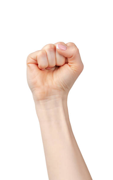 istock Female fist raised up isolated on white background 1727854977
