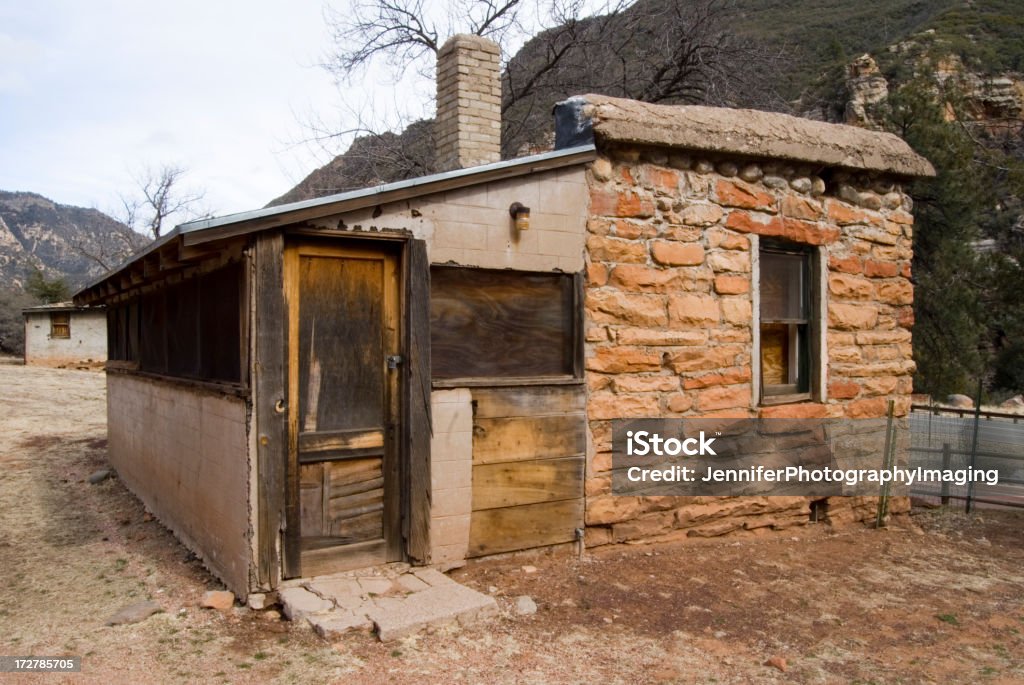 Old Cabin "a small, run-down cabin made of brick and wood, in Oak Creek Canyon, Arizona." Abandoned Stock Photo